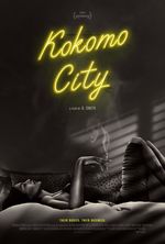 Black and white film noir style photograph of a Black trans woman laying on her back on a hotel bed and gazing towards the ceiling with a cigarette daintily in her hand. The caption "Their bodies. Their business" is placed in a small but bright yellow font at the bottom of the poster. The film title is in a yellow neon-sign style of writing at the top center of the poster.