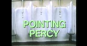 A shot of white urinals in a row with the film title "Pointing Percy" in large, faintly yellow-green capital letters.The room where the urinals are appears to be dingy with patchy, weathered walls and flooring.
